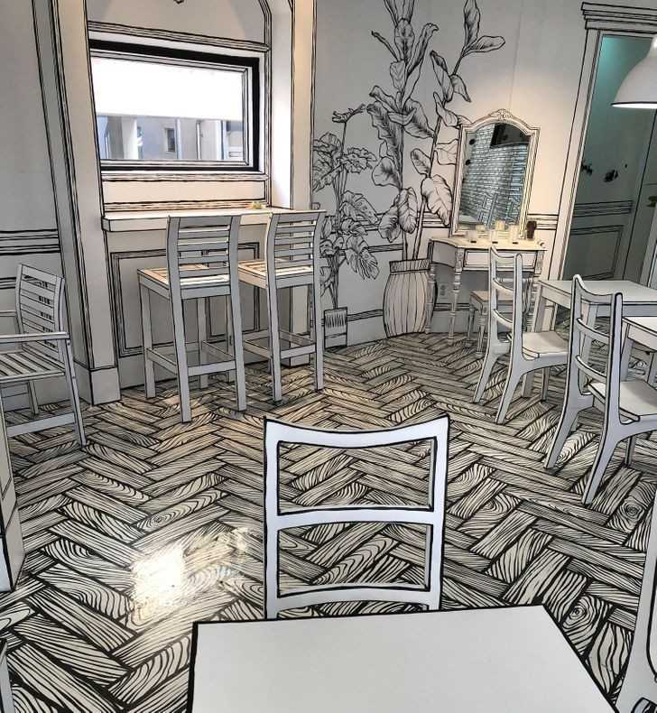 3. Kawiarnia w stylu 2D, wyglądająсa na żуwcem wyjętą z kolorowanki