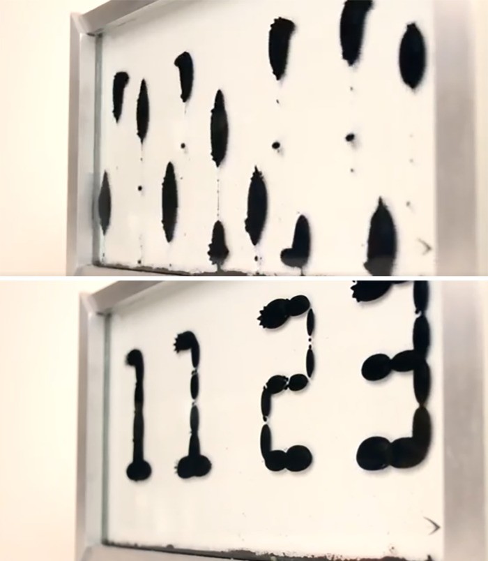 Zegar stworzony z wykorzystaniem ferrofluid - cieczy magnetycznej